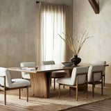 Featuring Marcon Natural Reclaimed French Oak Dining Table by Four Hands at Amethyst Home. Designed by Thomas Bina and Ronald Sasson, a design partnership blending both modern minimalist and Brazilian influences. Grand-scale dining table is crafted from natural reclaimed French oak with sleek tapered pedestal panels connected at the base. Seats 12.
Overall Dime. Amethyst Home provides interior design, new home construction design consulting, vintage area rugs, and lighting in the Omaha metro area.