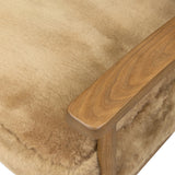 Classic Scandinavian design gets a supersoft update with a winged back panel of amber-finished oak floating above a chunky seat with exposed spindles. Paddle arms and ball feet add to the minimalist design. Covered in natural beige shearling for extra texture and comfort Amethyst Home provides interior design, new home construction design consulting, vintage area rugs, and lighting in the Scottsdale metro area.