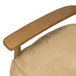 Classic Scandinavian design gets a supersoft update with a winged back panel of amber-finished oak floating above a chunky seat with exposed spindles. Paddle arms and ball feet add to the minimalist design. Covered in natural beige shearling for extra texture and comfort Amethyst Home provides interior design, new home construction design consulting, vintage area rugs, and lighting in the Washington metro area.