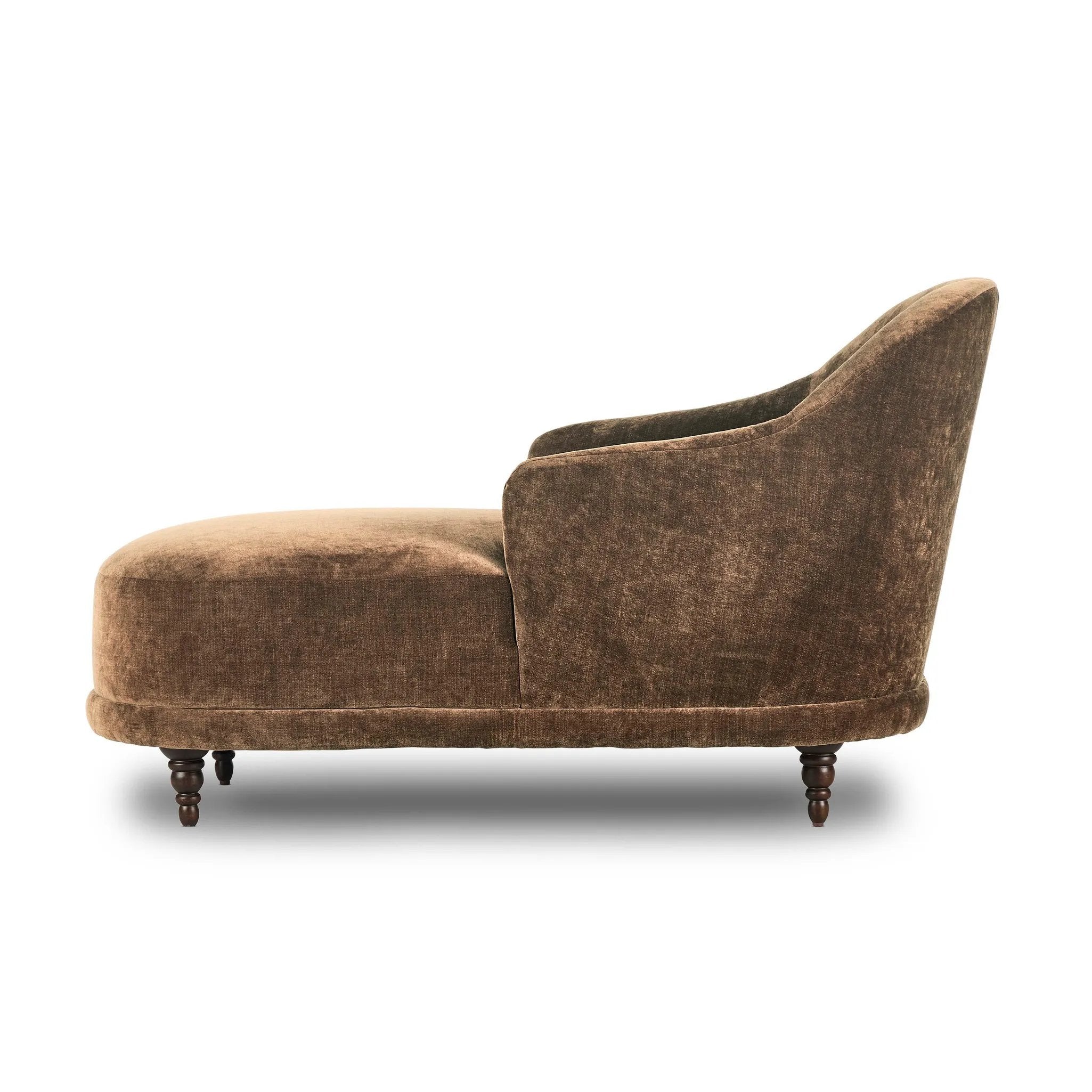 A traditional shape with modern styling, turned wooden legs complement the soft curves of this lounge-worthy chair. A chenill