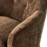 A traditional shape with modern styling, turned wooden legs complement the soft curves of this lounge-worthy chair. A chenill