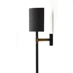 Featuring Maurice Matte Black Plaster Sconce by Four Hands at Amethyst Home. Housed behind a curved black shade, light beams with a soft glow both upward and downward from this plug-in sconce.  A  slim pole to hide the cord and a convenient switch on the backplate create a seamless look.Overall Dimensions: 8.00"w x 7.50"d x 50.00"hWeight : 6.61 lbsMaterials. Amethyst Home provides interior design, new home construction design consulting, vintage area rugs, and lighting in the Charlotte metro area.