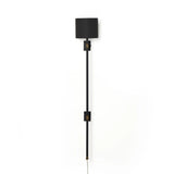 Featuring Maurice Matte Black Plaster Sconce by Four Hands at Amethyst Home. Housed behind a curved black shade, light beams with a soft glow both upward and downward from this plug-in sconce.  A  slim pole to hide the cord and a convenient switch on the backplate create a seamless look.Overall Dimensions: 8.00"w x 7.50"d x 50.00"hWeight : 6.61 lbsMaterials: . Amethyst Home provides interior design, new home construction design consulting, vintage area rugs, and lighting in the Houston metro area.