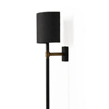 Featuring Maurice Matte Black Plaster Sconce by Four Hands at Amethyst Home. Housed behind a curved black shade, light beams with a soft glow both upward and downward from this plug-in sconce.  A  slim pole to hide the cord and a convenient switch on the backplate create a seamless look.Overall Dimensions: 8.00"w x 7.50"d x 50.00"hWeight : 6.61 lbsMaterials:. Amethyst Home provides interior design, new home construction design consulting, vintage area rugs, and lighting in the Monterey metro area.
