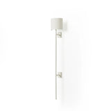 Featuring Maurice Matte White Plaster Sconce by Four Hands at Amethyst Home. Housed behind a curved black shade, light beams with a soft glow both upward and downward from this plug-in sconce.  A  slim pole to hide the cord and a convenient switch on the backplate create a seamless look.Overall Dimensions: 8.00"w x 7.50"d x 50.00"hWeight : 6.61 lbsMaterials. Amethyst Home provides interior design, new home construction design consulting, vintage area rugs, and lighting in the Park City metro area.