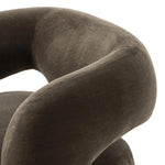 Featuring Mazie Monte Olive Swivel Chair by Four Hands at Amethyst Home. A fluid play on seating. This statement-making swivel chair features subtle cutouts on the back, with plush arms that hug the seat. Upholstered in an olive faux wool-mohair, bringing a plush moment to a classic frame.Overall Dimensions: 36.00"w x 32.00"d x 28.50"hWeight : 71.65 lbsMater. Amethyst Home provides interior design, new home construction design consulting, vintage area rugs, and lighting in the Monterey metro area.