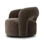Featuring Mazie Monte Olive Swivel Chair by Four Hands at Amethyst Home. A fluid play on seating. This statement-making swivel chair features subtle cutouts on the back, with plush arms that hug the seat. Upholstered in an olive faux wool-mohair, bringing a plush moment to a classic frame.Overall Dimensions: 36.00"w x 32.00"d x 28.50"hWeight : 71.65 lbsMater. Amethyst Home provides interior design, new home construction design consulting, vintage area rugs, and lighting in the Portland metro area.
