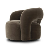 Featuring Mazie Monte Olive Swivel Chair by Four Hands at Amethyst Home. A fluid play on seating. This statement-making swivel chair features subtle cutouts on the back, with plush arms that hug the seat. Upholstered in an olive faux wool-mohair, bringing a plush moment to a classic frame.Overall Dimensions: 36.00"w x 32.00"d x 28.50"hWeight : 71.65 lbsMater. Amethyst Home provides interior design, new home construction design consulting, vintage area rugs, and lighting in the Portland metro area.