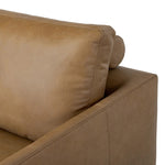 A minimalist form to redefine contemporary seating. Made from tan top-grain leather with a slim profile, expert tailoring and plush cushions for comfort. Sleek metal legs and compact sizing make this piece a versatile anchor for smaller living spaces Amethyst Home provides interior design, new home construction design consulting, vintage area rugs, and lighting in the Alpharetta metro area.