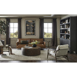 A minimalist form to redefine contemporary seating. Made from tan top-grain leather with a slim profile, expert tailoring and plush cushions for comfort. Sleek metal legs and compact sizing make this piece a versatile anchor for smaller living spaces Amethyst Home provides interior design, new home construction design consulting, vintage area rugs, and lighting in the Austin metro area.