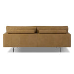 A minimalist form to redefine contemporary seating. Made from tan top-grain leather with a slim profile, expert tailoring and plush cushions for comfort. Sleek metal legs and compact sizing make this piece a versatile anchor for smaller living spaces Amethyst Home provides interior design, new home construction design consulting, vintage area rugs, and lighting in the Calabasas metro area.