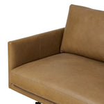 A minimalist form to redefine contemporary seating. Made from tan top-grain leather with a slim profile, expert tailoring and plush cushions for comfort. Sleek metal legs and compact sizing make this piece a versatile anchor for smaller living spaces Amethyst Home provides interior design, new home construction design consulting, vintage area rugs, and lighting in the Miami metro area.