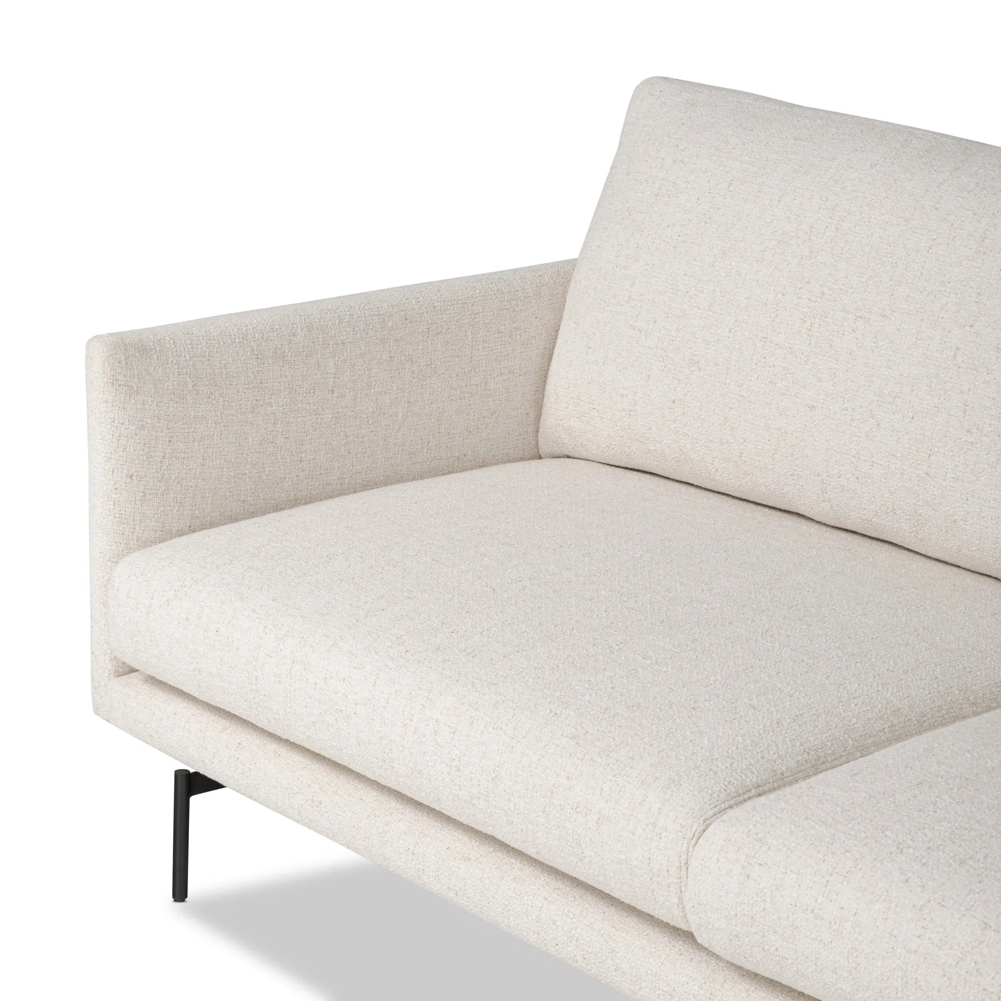 A minimalist form to redefine the contemporary sectional. Made from light, neutral high-performance with a slim profile, expert tailoring and plush cushions for comfort. Sleek metal legs and compact sizing make this piece a versatile anchor for smaller living spaces. Amethyst Home provides interior design, new home construction design consulting, vintage area rugs, and lighting in the Dallas metro area.