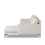 A minimalist form to redefine the contemporary sectional. Made from light, neutral high-performance with a slim profile, expert tailoring and plush cushions for comfort. Sleek metal legs and compact sizing make this piece a versatile anchor for smaller living spaces. Amethyst Home provides interior design, new home construction design consulting, vintage area rugs, and lighting in the Nashville metro area.