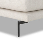 A minimalist form to redefine the contemporary sectional. Made from light, neutral high-performance with a slim profile, expert tailoring and plush cushions for comfort. Sleek metal legs and compact sizing make this piece a versatile anchor for smaller living spaces. Amethyst Home provides interior design, new home construction design consulting, vintage area rugs, and lighting in the Omaha metro area.