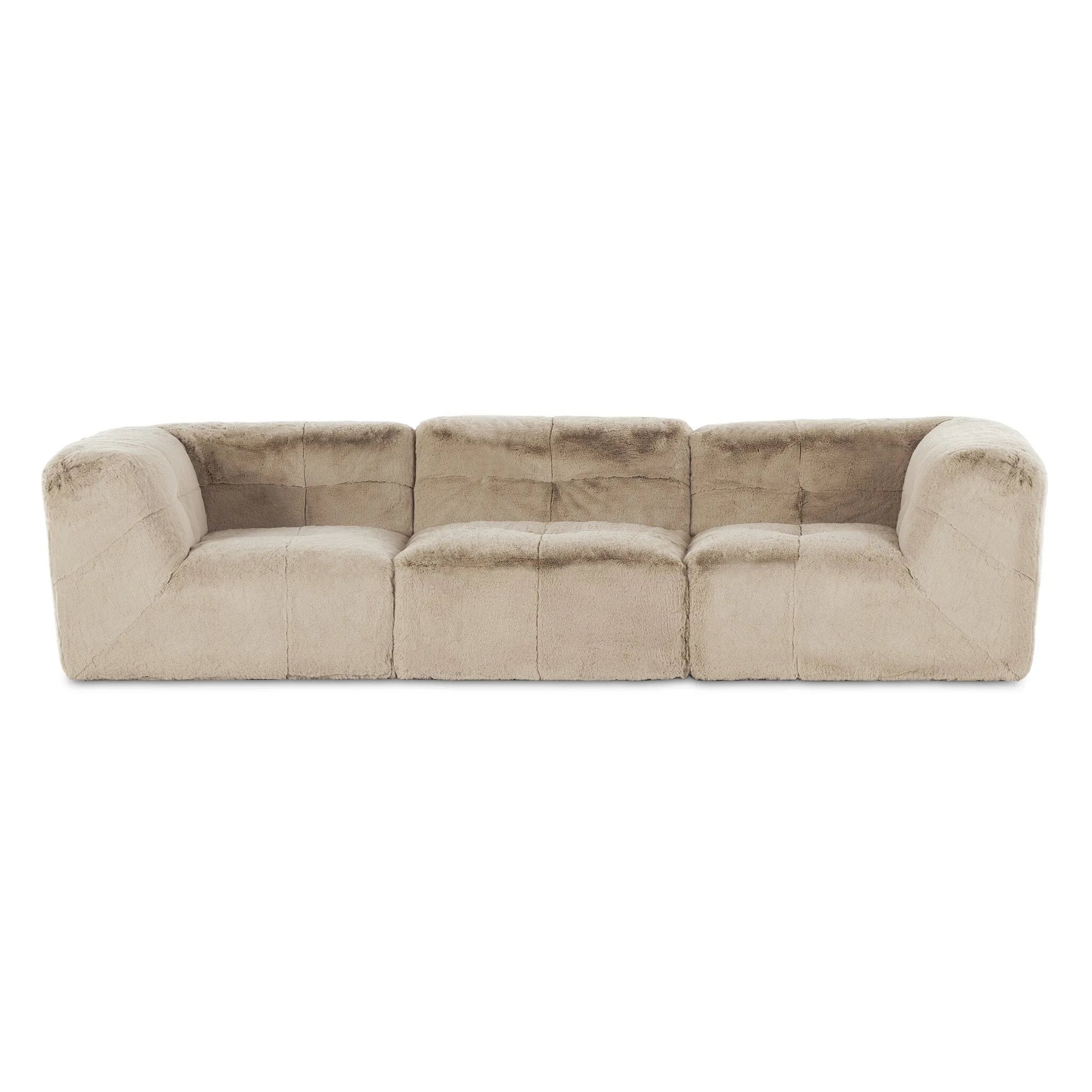 Modularity at its best — and comfiest. Three piece sectional covered in a plush fabric that's luxuriously soft to the touch Amethyst Home provides interior design, new home construction design consulting, vintage area rugs, and lighting in the Monterey metro area.