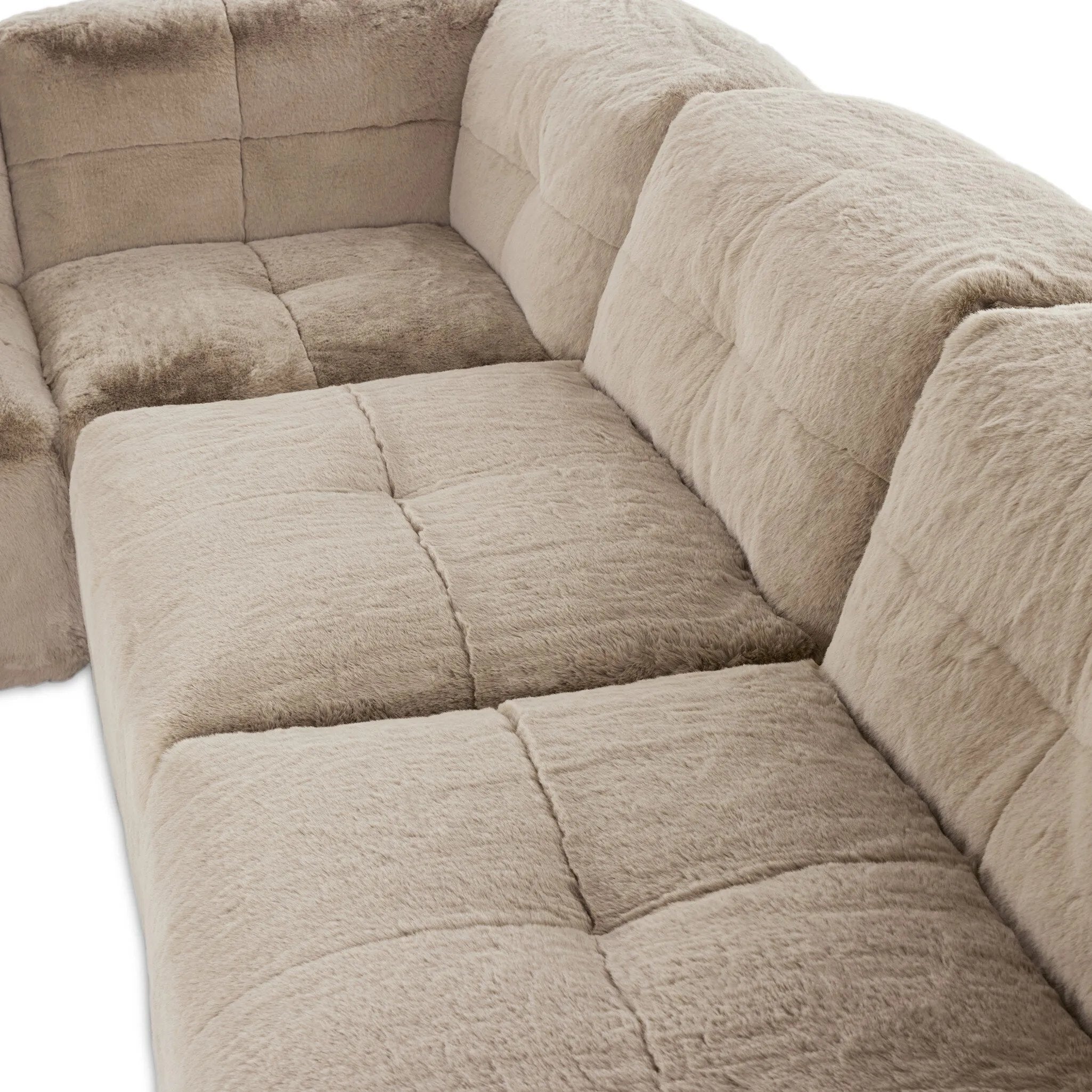 Featuring Miles Boden Pewter 7Pc Sectional by Four Hands at Amethyst Home. Modularity at its best, and softest. This versatile sectional includes seven pieces crafted with soft cushioning and S-spring suspension for a supportive sit. All covered in a plush, furry fabric that feels luxurious to sink into. Discreet seams add a touch of structure throughout. Ove. Amethyst Home provides interior design, new home construction design consulting, vintage area rugs, and lighting in the Houston metro area.