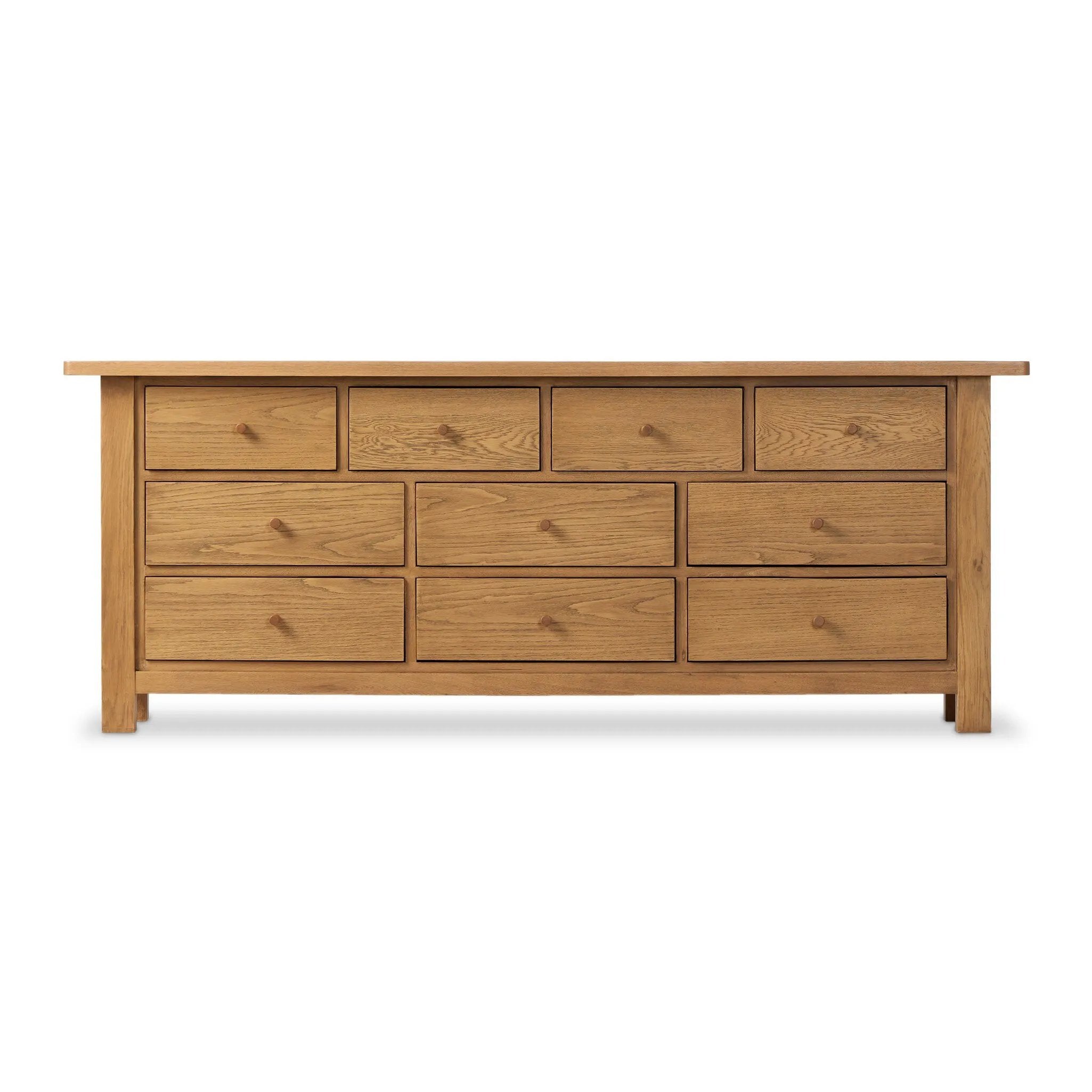 Drawing inspiration from a vintage general store counter, a storage-driven dresser reflects traditional and functional design. Thick oak legs with softened corners provide sturdy support, while oak knobs add a classic touch. An inset tray top and a versatile drawer configuration offer ample storage Amethyst Home provides interior design, new home construction design consulting, vintage area rugs, and lighting in the Salt Lake City metro area.
