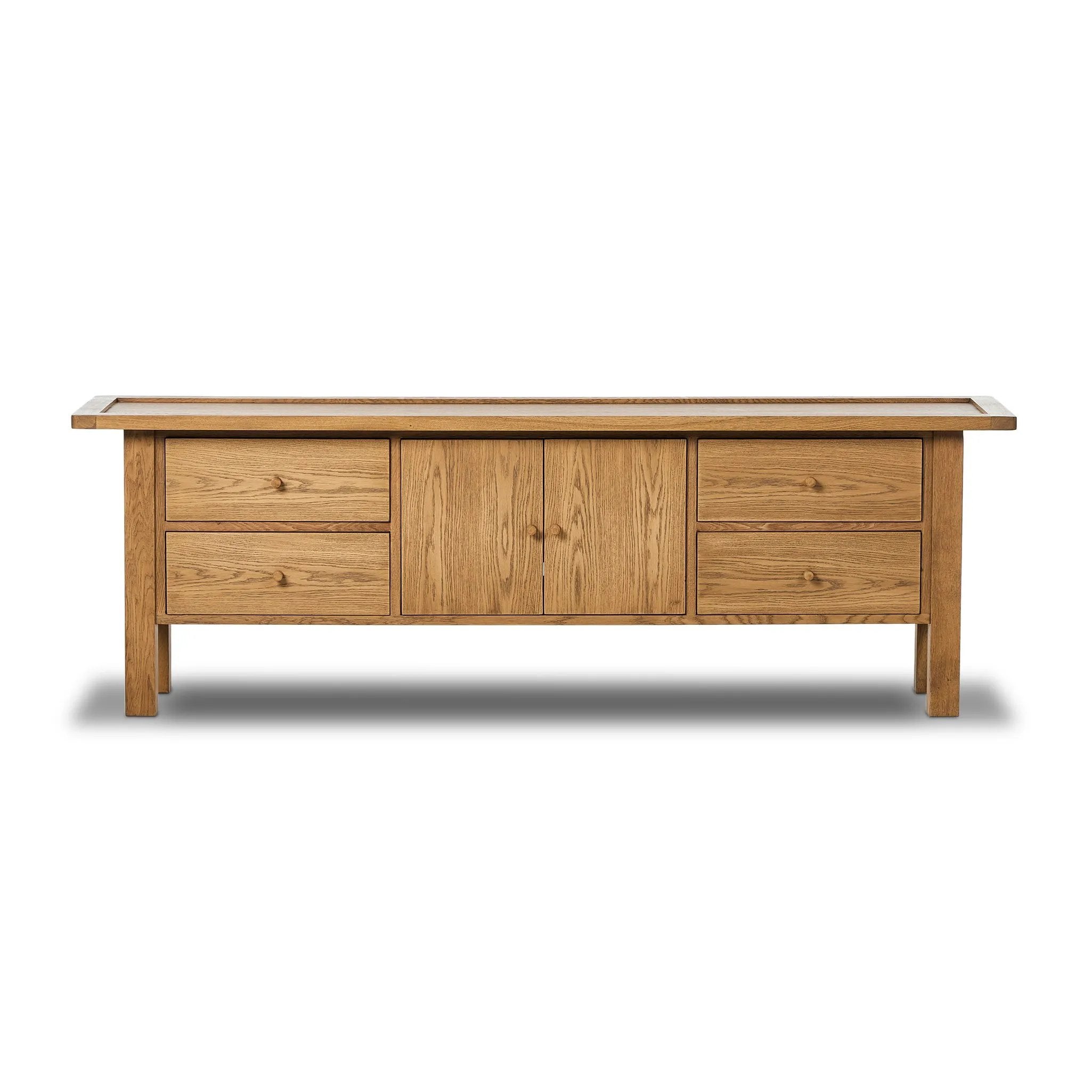 Inspired by a vintage general store counter, this console table features a heritage design with a modern twist. Thick oak legs with softened corners provide sturdy support, while oak knobs add a touch of classic charm. The inset tray top and varied drawer configuration offer ample storage Amethyst Home provides interior design, new home construction design consulting, vintage area rugs, and lighting in the Alpharetta metro area.