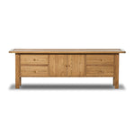 Featuring Millbrook Natural Light Oak Media Console by Four Hands at Amethyst Home. Inspired by a vintage general store counter, this console table features a heritage design with a modern twist. Thick oak legs with softened corners provide sturdy support, while oak knobs add a touch of classic charm. The inset tray top and varied drawer configuration offer am. Amethyst Home provides interior design, new home construction design consulting, vintage area rugs, and lighting in the Dallas metro area.