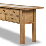 Featuring Millbrook Natural Light Oak Veneer Console Table by Four Hands at Amethyst Home. Inspired by a vintage general store counter, this console table features a heritage design with a modern twist. Thick oak legs with softened corners provide sturdy support, while oak knobs add a touch of classic charm. The inset tray top and varied drawer configura. Amethyst Home provides interior design, new home construction design consulting, vintage area rugs, and lighting in the Laguna Beach metro area.