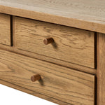Featuring Millbrook Natural Light Oak Veneer Console Table by Four Hands at Amethyst Home. Inspired by a vintage general store counter, this console table features a heritage design with a modern twist. Thick oak legs with softened corners provide sturdy support, while oak knobs add a touch of classic charm. The inset tray top and varied drawer configuration of. Amethyst Home provides interior design, new home construction design consulting, vintage area rugs, and lighting in the Omaha metro area.