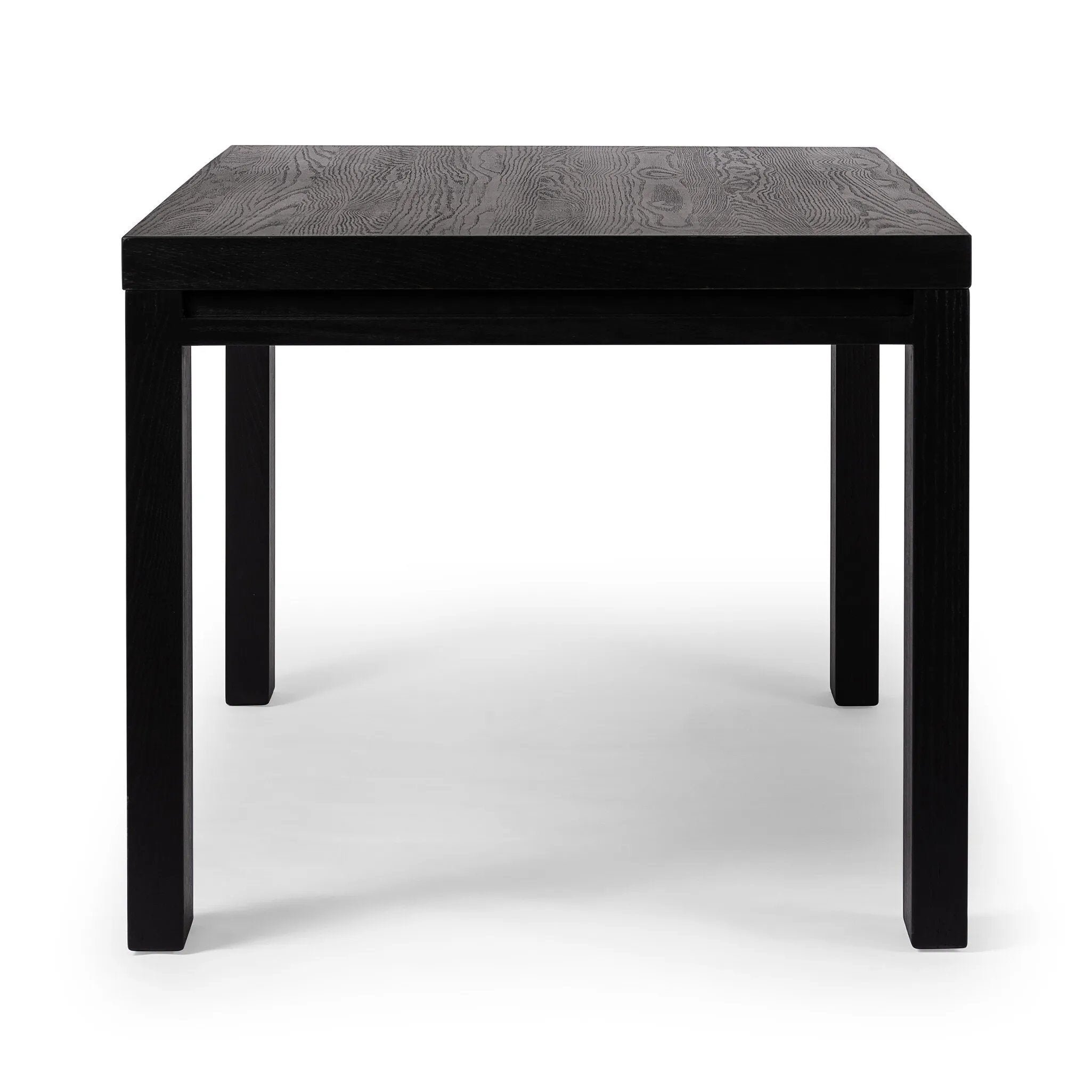 Featuring Millie Drifted Matte Black Veneer Dining Table by Four Hands at Amethyst Home. Angled legs place a modern twist on the timeless Parsons table. Versatile black-finished oak moves between styles and color palettes with ease.
Overall Dimensions: 35.0" L x 72.0 " W x 30.0" H
Materials: Oak Veneer, Solid Oak, Poplar PlywoodWeight: 154.32 lbs. Amethyst Home provides interior design, new home construction design consulting, vintage area rugs, and lighting in the Boston metro area.