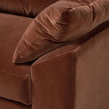 Structured yet deceivingly comfortable. The pillow-engulfed sofa features a distinctive raised seat deck with knife-edge cushions. Tapered arms include integrated pillows, while the tight seat-back provides a stable resting spot for its plush, loose-back pillows. Amethyst Home provides interior design, new home construction design consulting, vintage area rugs, and lighting in the Park City metro area.