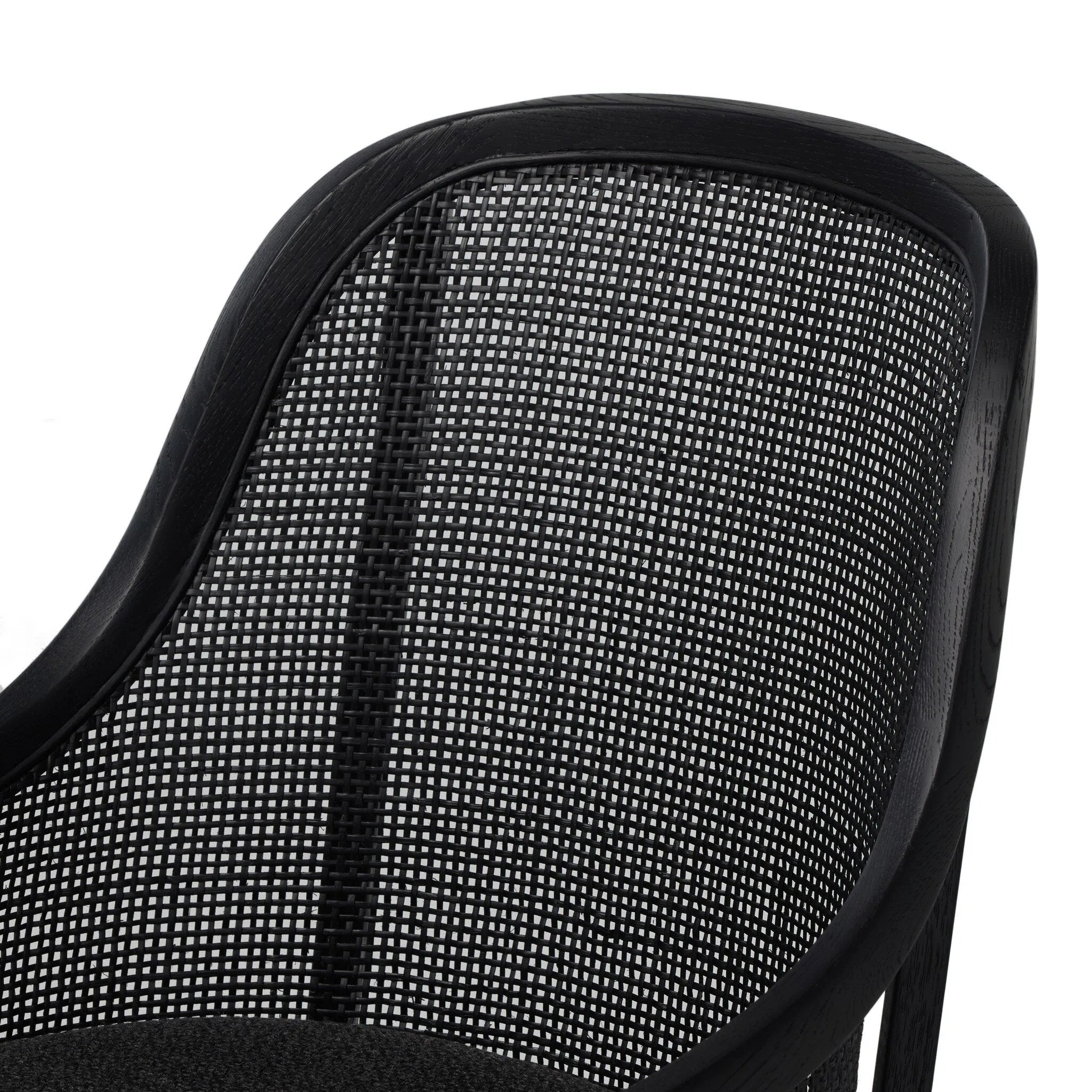 Contemporary details meet traditional design. Thin black oak frames a woven rattan back, offering an elevated take on the everyday desk chair.As fans of wabi sabi materials at Amethyst, we love the designer inspired Mischa Desk Chair. This item pairs well with other brands such as Visual Comfort and is perfect for minimalist homes Amethyst Home provides interior design, new home construction design consulting, vintage area rugs, and lighting in the Houston metro area.