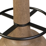 Mixed materials make the look. A drifted oak base features soft curves and slight angles for an updated take on traditional turn shaping. A neutral performance fabric seat and aged iron footrests ensure comfort and durability. Perfectly sized for the counter. Amethyst Home provides interior design, new home construction design consulting, vintage area rugs, and lighting in the Des Moines metro area.