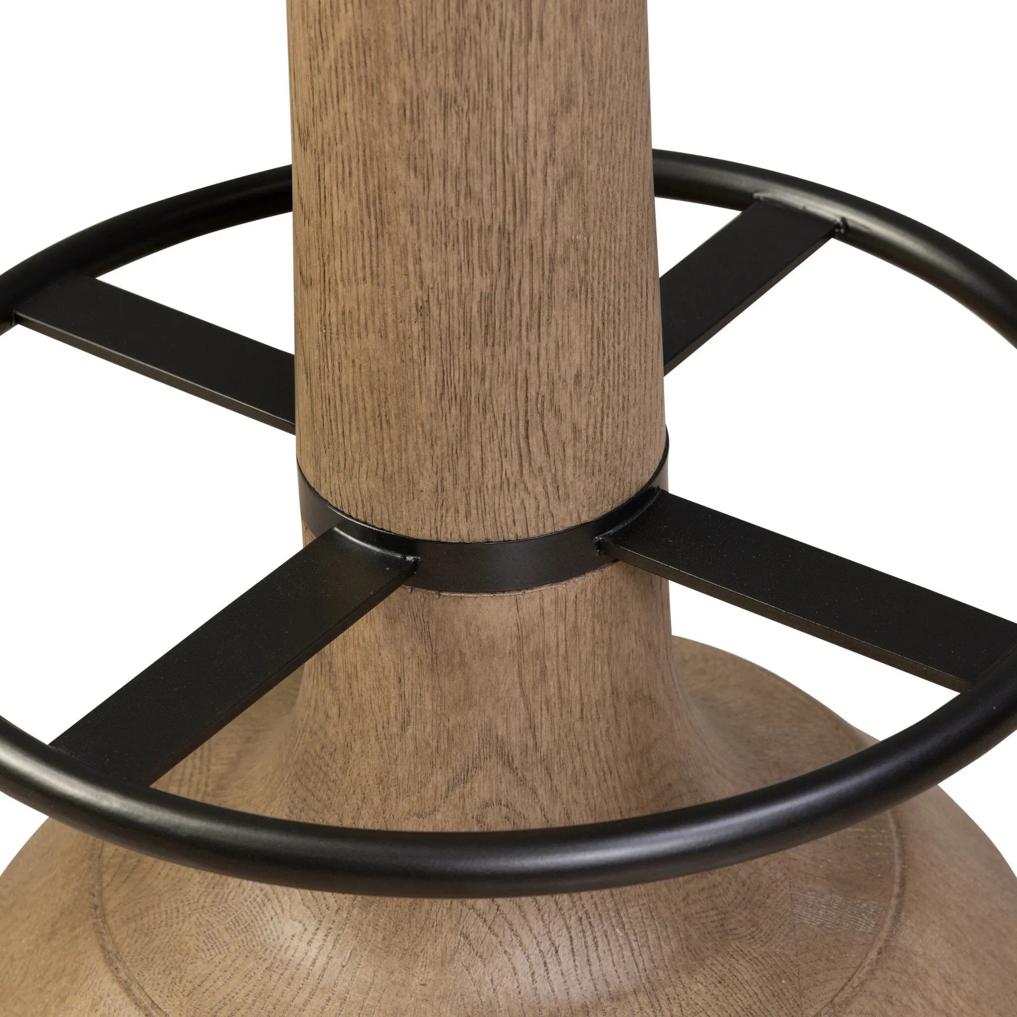 Mixed materials make the look. A drifted oak base features soft curves and slight angles for an updated take on traditional turn shaping. A neutral performance fabric seat and aged iron footrests ensure comfort and durability. Perfectly sized for the counter. Amethyst Home provides interior design, new home construction design consulting, vintage area rugs, and lighting in the Des Moines metro area.