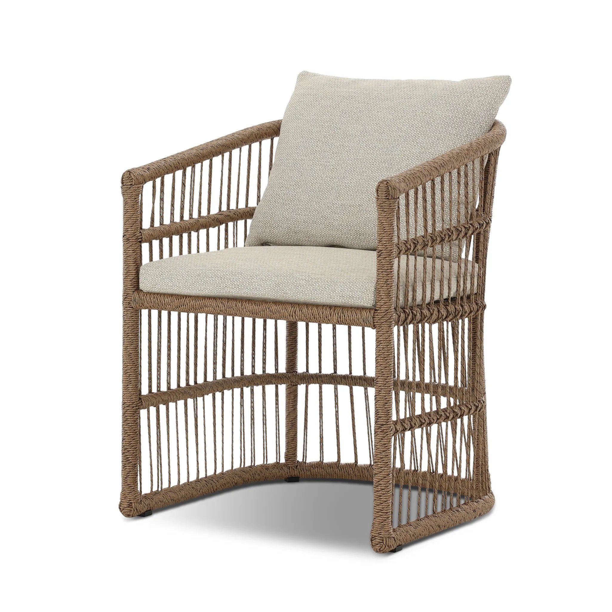 Cottage-inspired, faux hyacinth mimics its natural counterpart, with joint wrapping and texture for depth and character defining this outdoor dining chair. Varied proportion for dimension. Upholstered in a UV-resistant, water-repellent, quick-drying fabric. Cover or store indoors during inclement weather and when not in use Amethyst Home provides interior design, new home construction design consulting, vintage area rugs, and lighting in the Calabasas metro area.