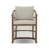 Cottage-inspired, faux hyacinth mimics its natural counterpart, with joint wrapping and texture for depth and character defining this outdoor dining chair. Varied proportion for dimension. Upholstered in a UV-resistant, water-repellent, quick-drying fabric. Cover or store indoors during inclement weather and when not in use Amethyst Home provides interior design, new home construction design consulting, vintage area rugs, and lighting in the Houston metro area.