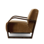 A luxe material mix at play. Deep plush seating in a high pile velvet is paired with an exaggerated 1920s Art Deco-inspired frame. Its bentwood arms are sculpted from mappa burl for extra movement throughout the piece. Amethyst Home provides interior design, new home construction design consulting, vintage area rugs, and lighting in the Alpharetta metro area.