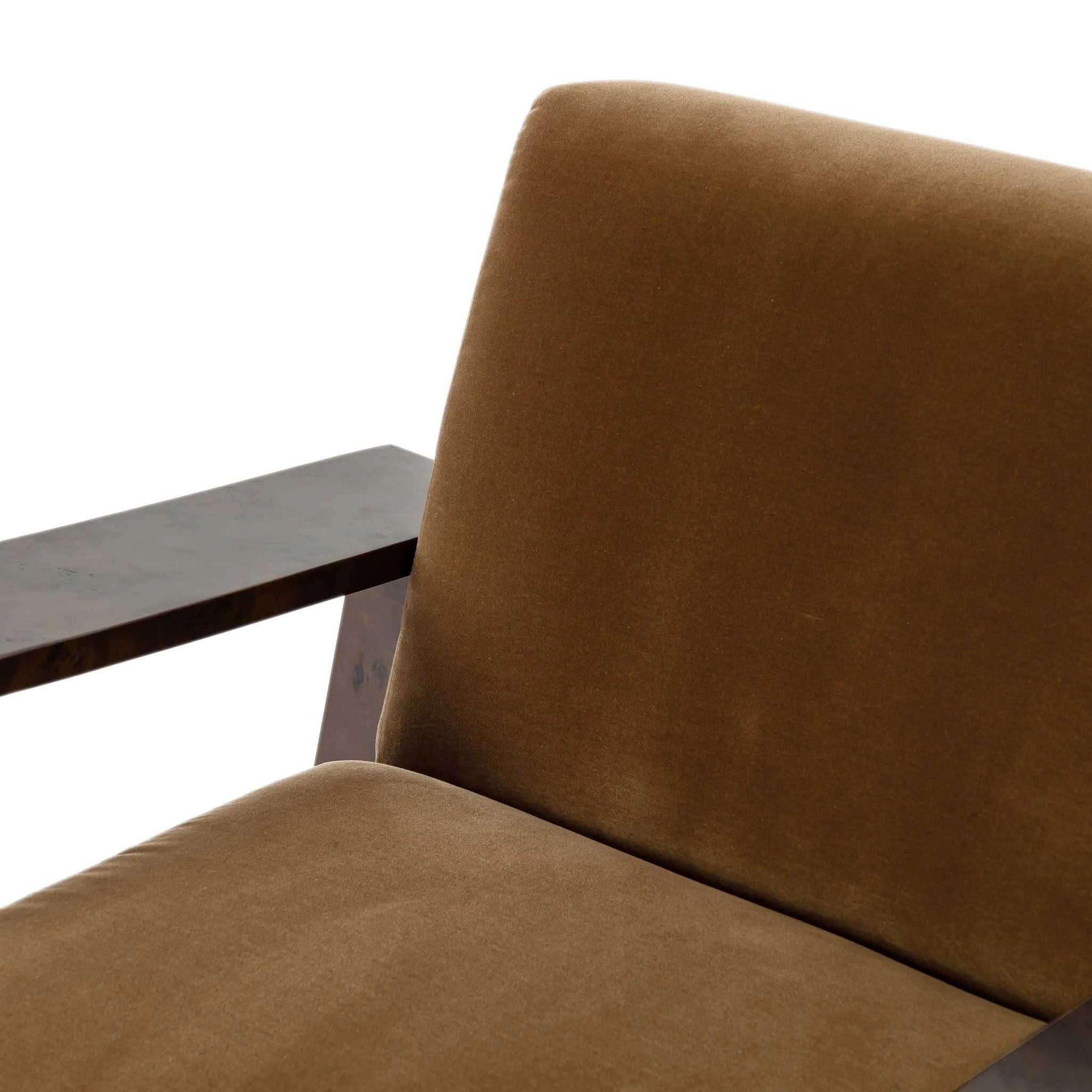 A luxe material mix at play. Deep plush seating in a high pile velvet is paired with an exaggerated 1920s Art Deco-inspired frame. Its bentwood arms are sculpted from mappa burl for extra movement throughout the piece. Amethyst Home provides interior design, new home construction design consulting, vintage area rugs, and lighting in the Austin metro area.