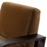 A luxe material mix at play. Deep plush seating in a high pile velvet is paired with an exaggerated 1920s Art Deco-inspired frame. Its bentwood arms are sculpted from mappa burl for extra movement throughout the piece. Amethyst Home provides interior design, new home construction design consulting, vintage area rugs, and lighting in the Boston metro area.