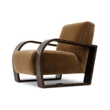 A luxe material mix at play. Deep plush seating in a high pile velvet is paired with an exaggerated 1920s Art Deco-inspired frame. Its bentwood arms are sculpted from mappa burl for extra movement throughout the piece. Amethyst Home provides interior design, new home construction design consulting, vintage area rugs, and lighting in the Dallas metro area.