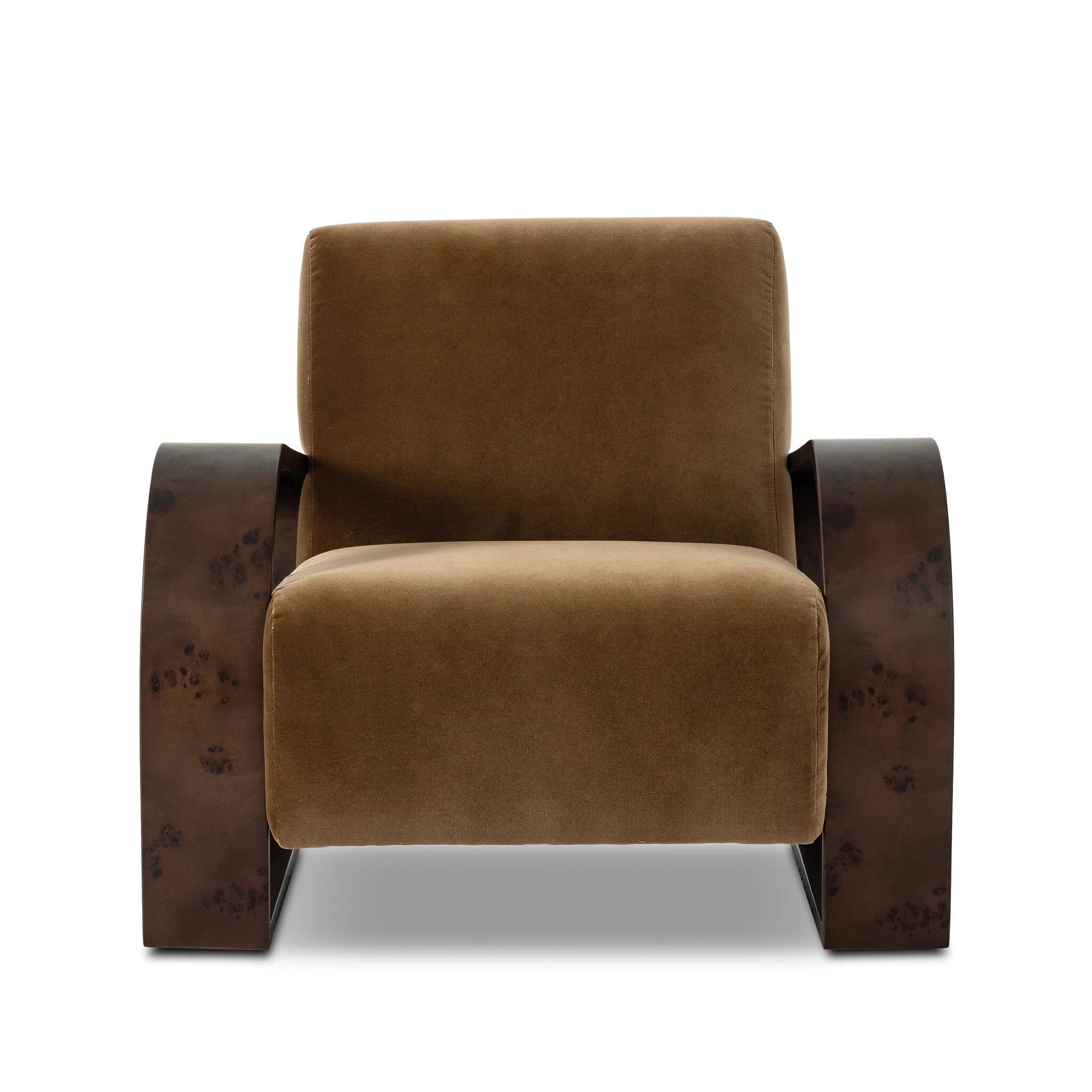 A luxe material mix at play. Deep plush seating in a high pile velvet is paired with an exaggerated 1920s Art Deco-inspired frame. Its bentwood arms are sculpted from mappa burl for extra movement throughout the piece. Amethyst Home provides interior design, new home construction design consulting, vintage area rugs, and lighting in the Houston metro area.