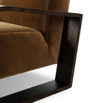 A luxe material mix at play. Deep plush seating in a high pile velvet is paired with an exaggerated 1920s Art Deco-inspired frame. Its bentwood arms are sculpted from mappa burl for extra movement throughout the piece. Amethyst Home provides interior design, new home construction design consulting, vintage area rugs, and lighting in the Kansas City metro area.
