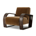 A luxe material mix at play. Deep plush seating in a high pile velvet is paired with an exaggerated 1920s Art Deco-inspired frame. Its bentwood arms are sculpted from mappa burl for extra movement throughout the piece. Amethyst Home provides interior design, new home construction design consulting, vintage area rugs, and lighting in the Omaha metro area.