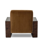 A luxe material mix at play. Deep plush seating in a high pile velvet is paired with an exaggerated 1920s Art Deco-inspired frame. Its bentwood arms are sculpted from mappa burl for extra movement throughout the piece. Amethyst Home provides interior design, new home construction design consulting, vintage area rugs, and lighting in the Washington metro area.