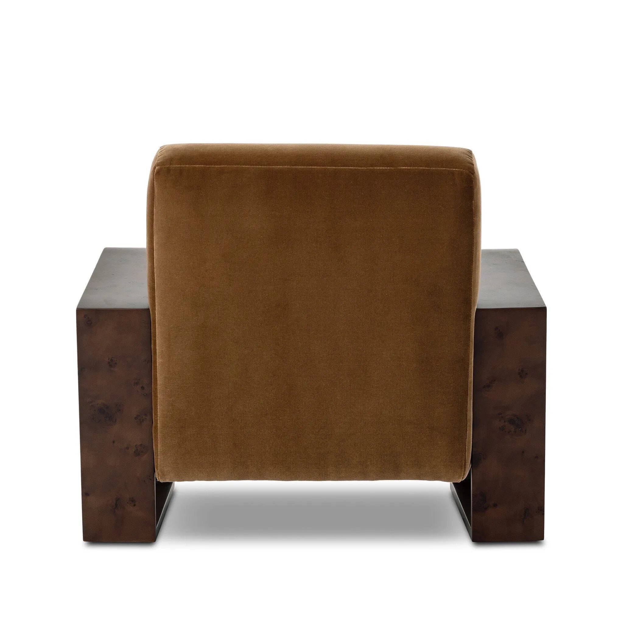 A luxe material mix at play. Deep plush seating in a high pile velvet is paired with an exaggerated 1920s Art Deco-inspired frame. Its bentwood arms are sculpted from mappa burl for extra movement throughout the piece. Amethyst Home provides interior design, new home construction design consulting, vintage area rugs, and lighting in the Washington metro area.
