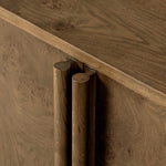 Finished in a unique rye, a mix of solid oak and oak veneer shape a simplified four-door sideboard, with subtly rounded corners for a touch of softness. Large, exaggerated hardware finishes the look.As fans of natural aesthetics at Amethyst, we love the nature inspired Morley Sideboard - Rye Medium Burl Oak Veneer. Amethyst Home provides interior design, new home construction design consulting, vintage area rugs, and lighting in the Seattle metro area.