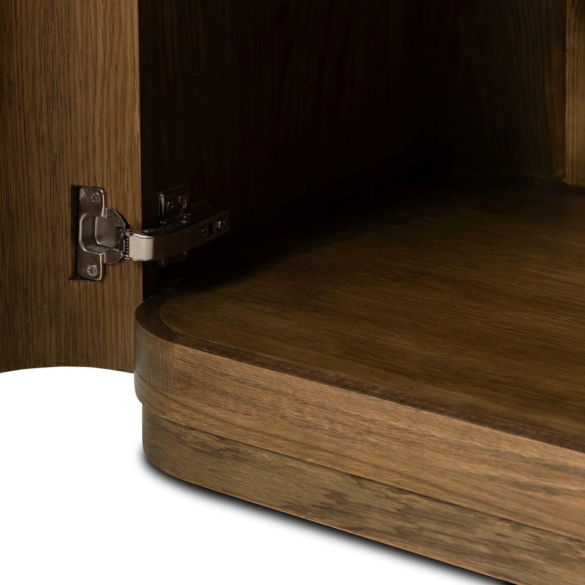 Finished in a unique rye, a mix of solid oak and oak veneer shape a simplified four-door sideboard, with subtly rounded corners for a touch of softness. Large, exaggerated hardware finishes the look.As fans of natural aesthetics at Amethyst, we love the nature inspired Morley Sideboard - Rye Medium Burl Oak Veneer. Amethyst Home provides interior design, new home construction design consulting, vintage area rugs, and lighting in the Tampa metro area.
