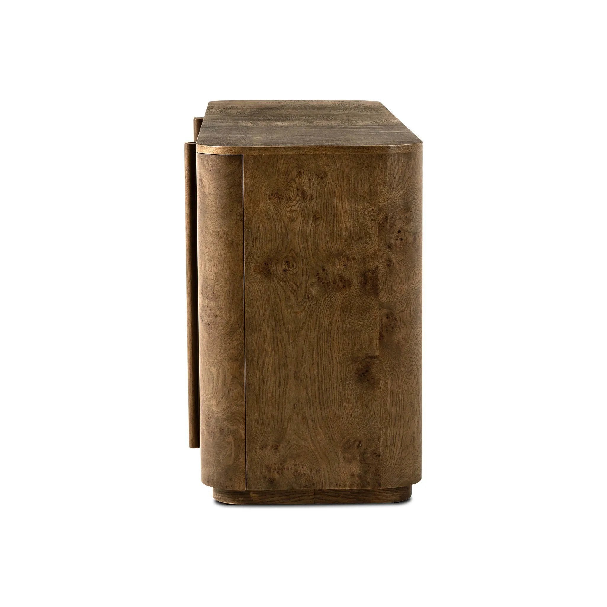 Finished in a unique rye, a mix of solid oak and oak veneer shape a simplified four-door sideboard, with subtly rounded corners for a touch of softness. Large, exaggerated hardware finishes the look.As fans of natural aesthetics at Amethyst, we love the nature inspired Morley Sideboard - Rye Medium Burl Oak Veneer. Amethyst Home provides interior design, new home construction design consulting, vintage area rugs, and lighting in the Washington metro area.