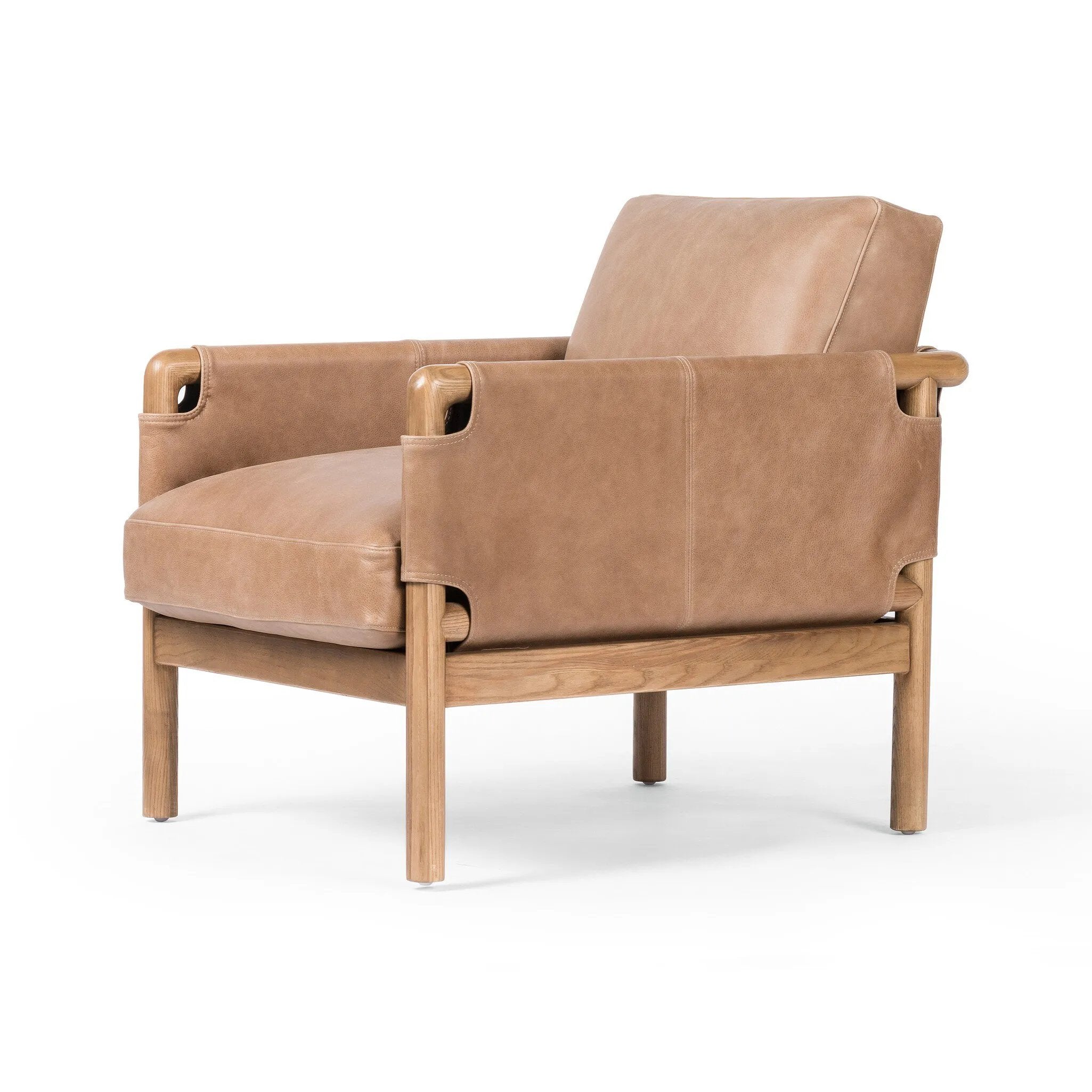 Featuring Navarro Palermo Drift Chair by Four Hands at Amethyst Home. Safari inspiration meets zen aspirations. A cylindrical frame is crafted, smoothed and rounded from solid ash wood. Includes two loose feather-blend cushions covered in subtly distressed thick cut leather in a neutral taupe hue for a monochromatic look. Overall Dimensions: 27.75"w x 34.0. Amethyst Home provides interior design, new home construction design consulting, vintage area rugs, and lighting in the Alpharetta metro area.