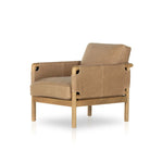 Featuring Navarro Palermo Drift Chair by Four Hands at Amethyst Home. Safari inspiration meets zen aspirations. A cylindrical frame is crafted, smoothed and rounded from solid ash wood. Includes two loose feather-blend cushions covered in subtly distressed thick cut leather in a neutral taupe hue for a monochromatic look. Overall Dimensions: 27.75"w x 34.00"d . Amethyst Home provides interior design, new home construction design consulting, vintage area rugs, and lighting in the Boston metro area.