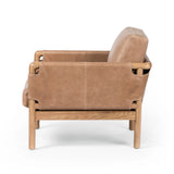 Featuring Navarro Palermo Drift Chair by Four Hands at Amethyst Home. Safari inspiration meets zen aspirations. A cylindrical frame is crafted, smoothed and rounded from solid ash wood. Includes two loose feather-blend cushions covered in subtly distressed thick cut leather in a neutral taupe hue for a monochromatic look. Overall Dimensions: 27.75"w x 34.0. Amethyst Home provides interior design, new home construction design consulting, vintage area rugs, and lighting in the Des Moines metro area.