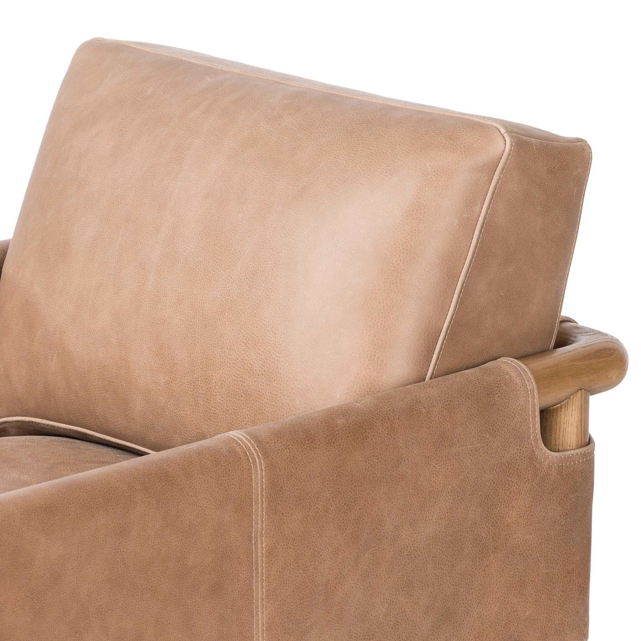 Featuring Navarro Palermo Drift Chair by Four Hands at Amethyst Home. Safari inspiration meets zen aspirations. A cylindrical frame is crafted, smoothed and rounded from solid ash wood. Includes two loose feather-blend cushions covered in subtly distressed thick cut leather in a neutral taupe hue for a monochromatic look. Overall Dimensions: 27.75"w x . Amethyst Home provides interior design, new home construction design consulting, vintage area rugs, and lighting in the Salt Lake City metro area.