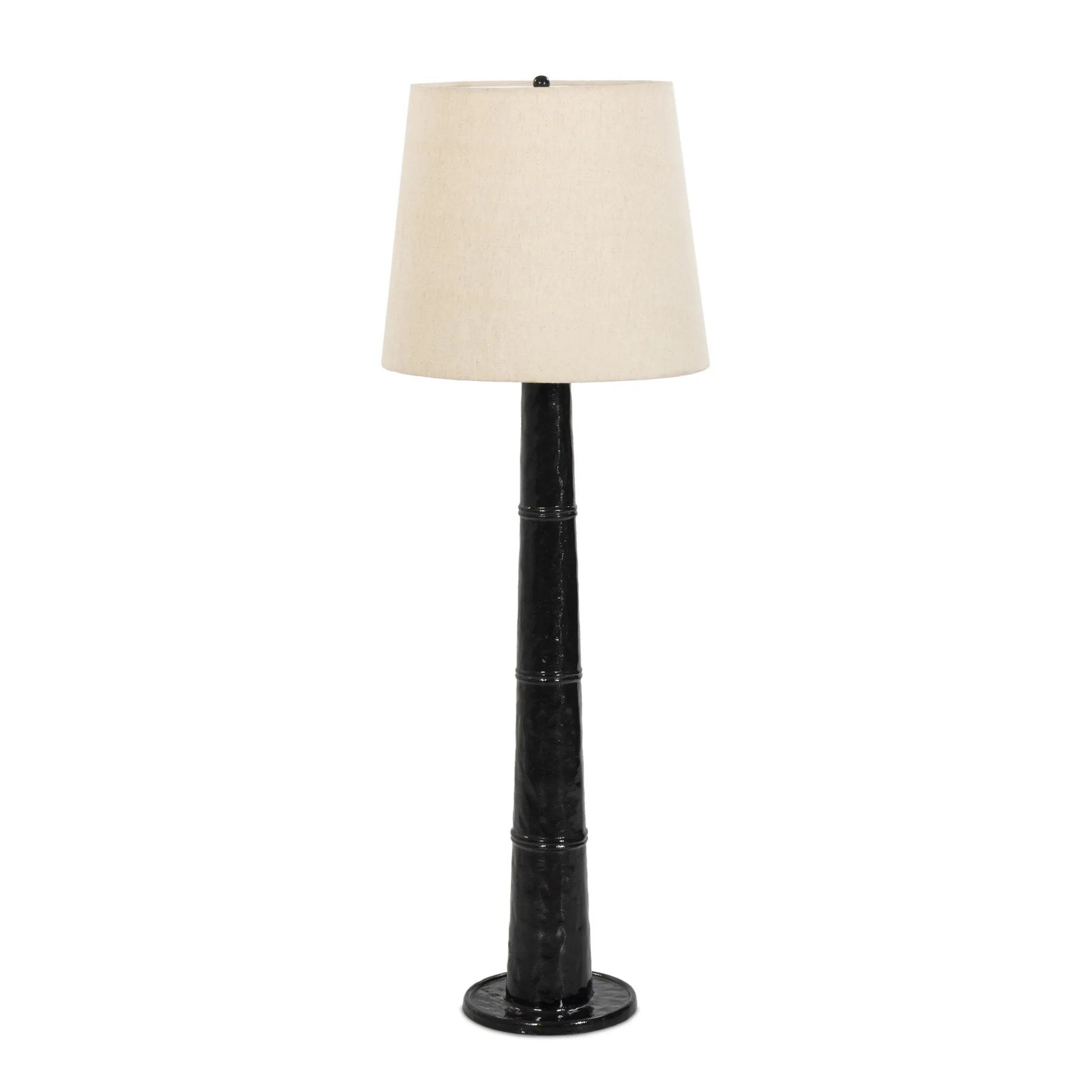 Inspired by a vintage salt shaker found while exploring Copenhagen, Denmark, this glossy cast aluminum lamp has a telescoping shape that's finished with a traditional flax linen shade Amethyst Home provides interior design, new home construction design consulting, vintage area rugs, and lighting in the Nashville metro area.